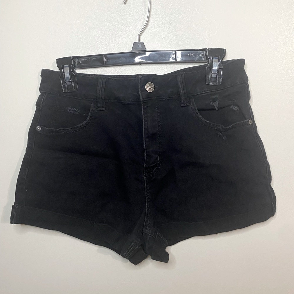 Rewash New York 7/28 stretch black distressed denim.